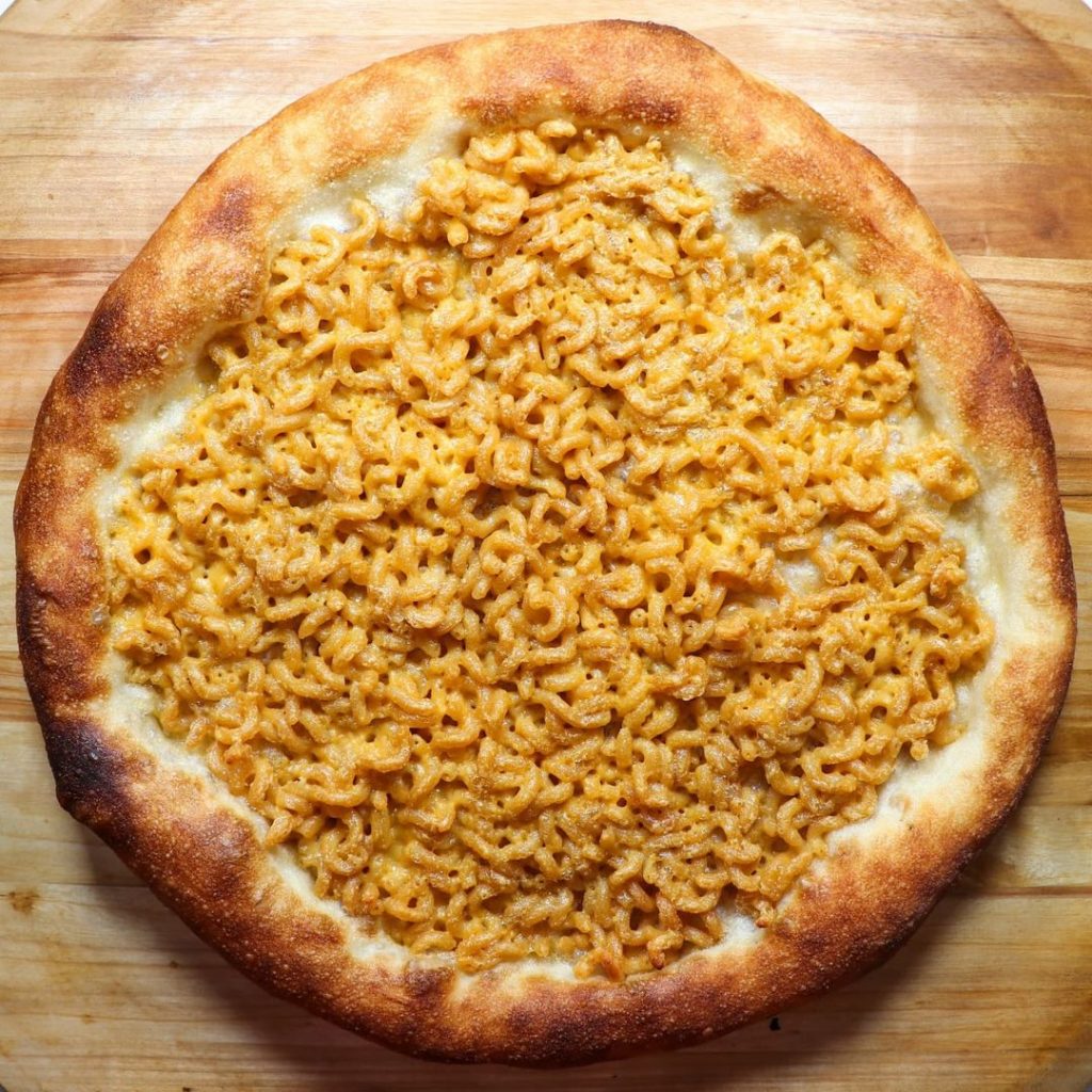 A mac and cheese pizza is one of the weirdest pizza toppings and combinations.