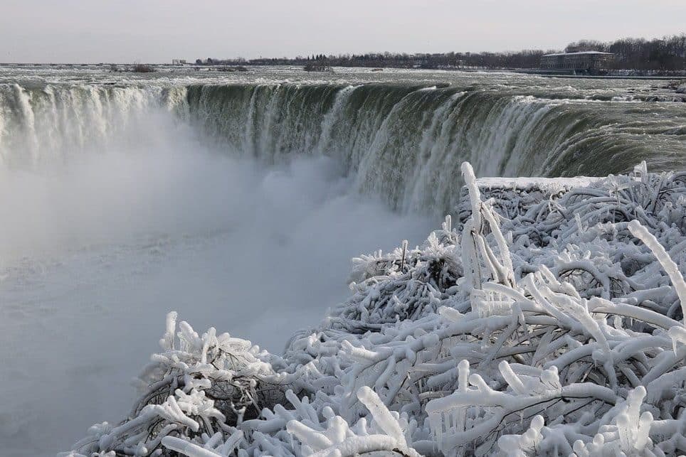 Witnessing the frozen Niagara Falls tops our list of things to do in Toronto in winter.