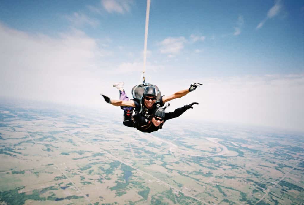 Plummet back to earth while skydiving.