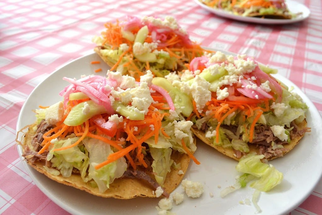 The tostada is one of the best Mexican street foods you should try.