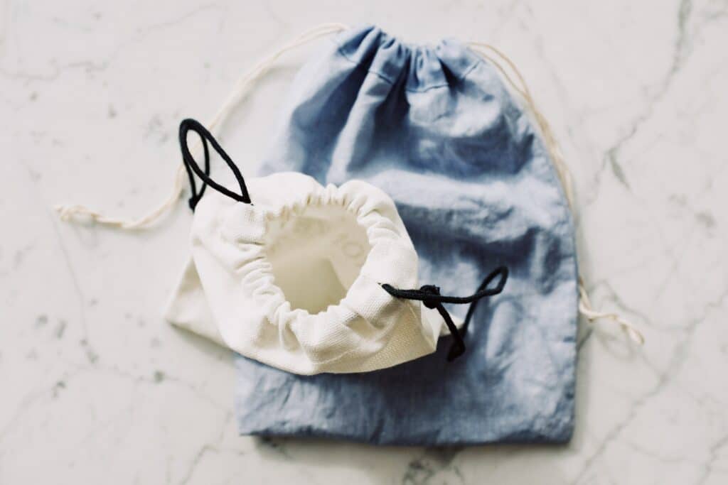 A laundry bag is one of our travel essentials for women.