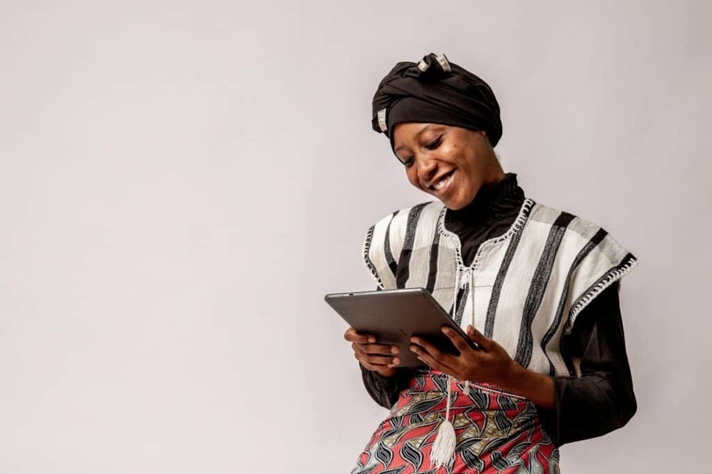 A woman adorned in northern Nigerian attire, representing the diverse languages spoken in Nigeria.