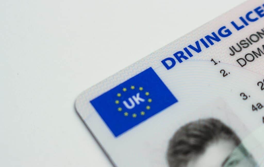 The top left corner of a UK driving licence. Keeping ID cards handy is on of our Nigeria travel tips.