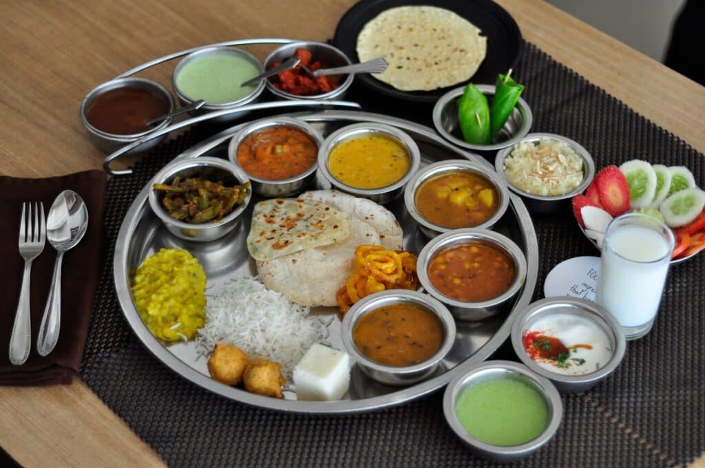 Picture of a classic Vegan Thali, as one of the vegan meals you can find in Soul Kitchen, which is one of the 10 best places for vegan food in Rishikesh.