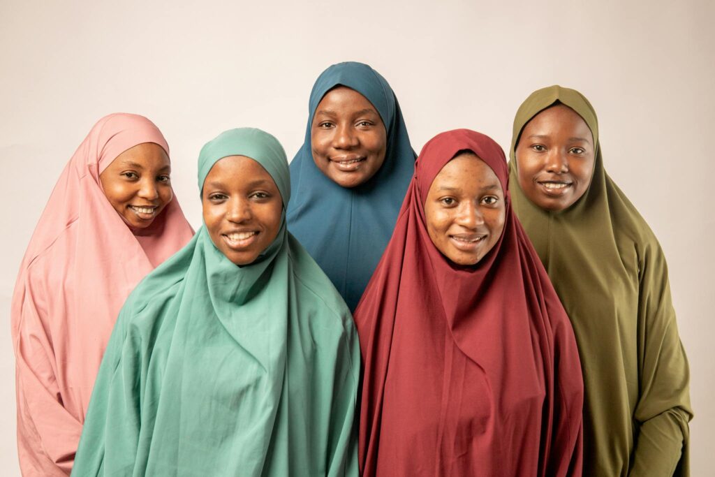 Northern women of Nigeria from the Hausa tribe. The Hausa language is among the most popular languages in Nigeria, and even if you don't know how many languages are in Nigeria, you probably know Hausa.