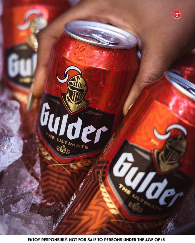 An image of a cooler filled with ice and cans of Gulder beer, one of Nigeria's best beers.